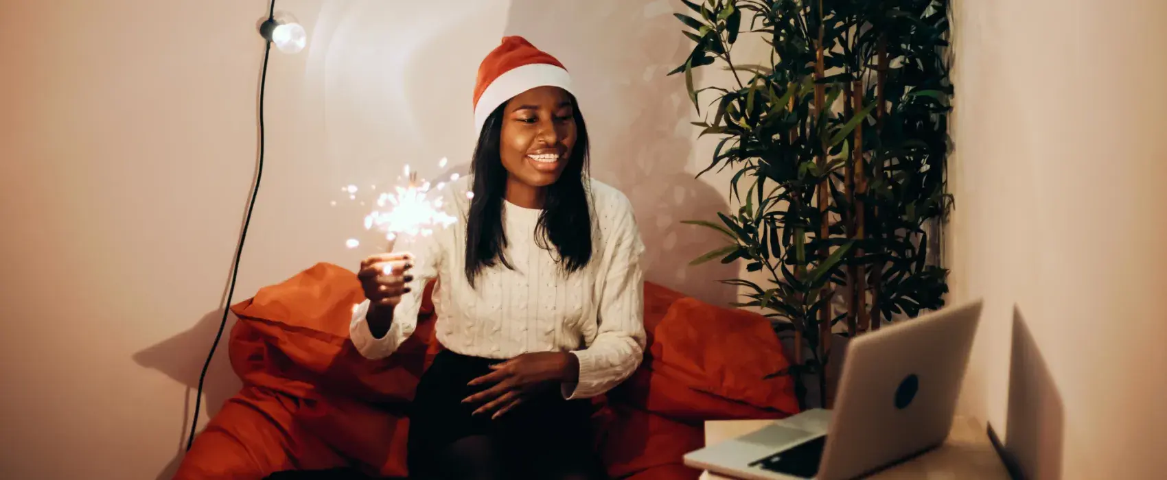Woman virtually celebrating christmas
