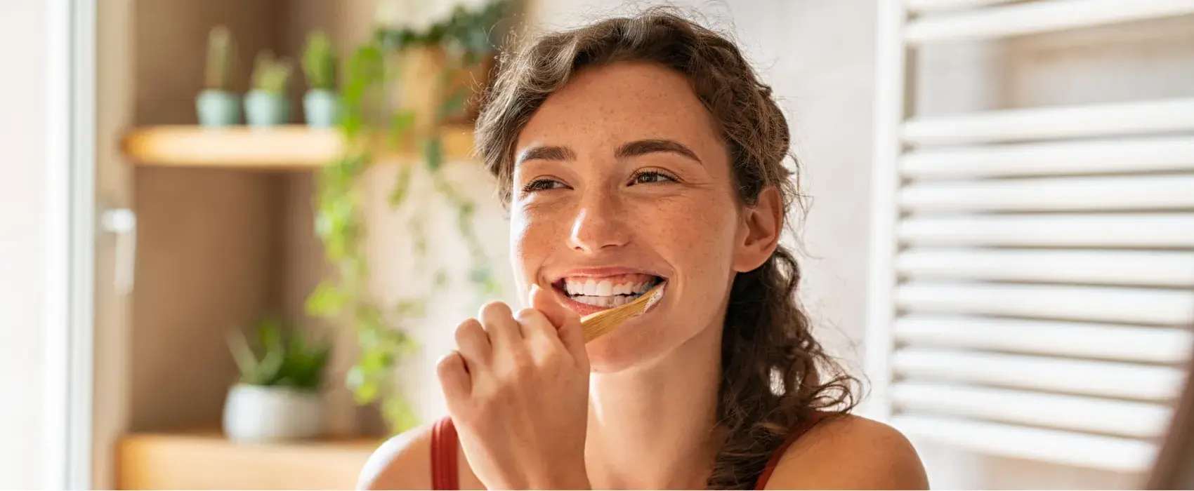 Woman brushing her teeth