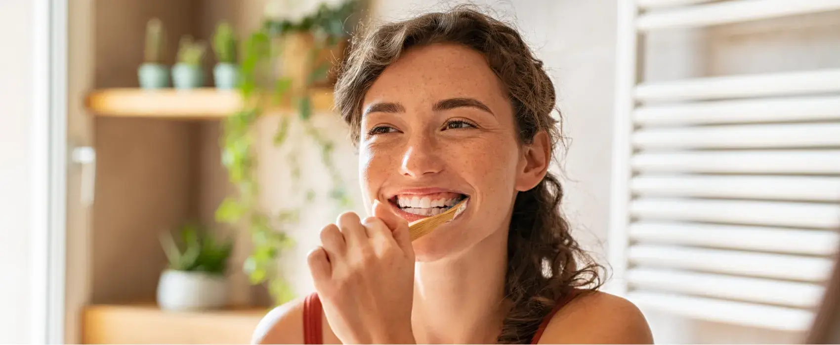 Woman brushing her teeth