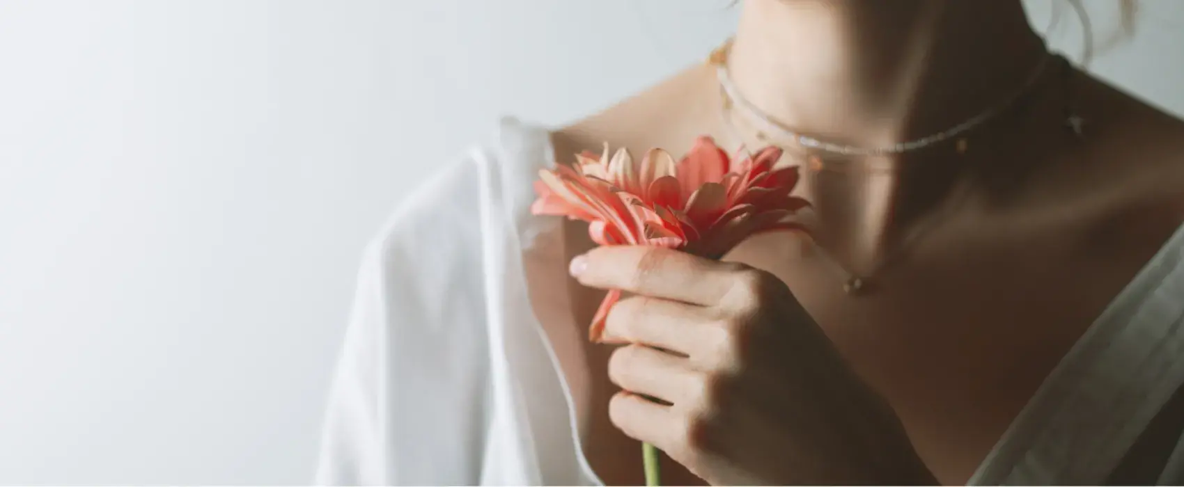 Woman holding a flower