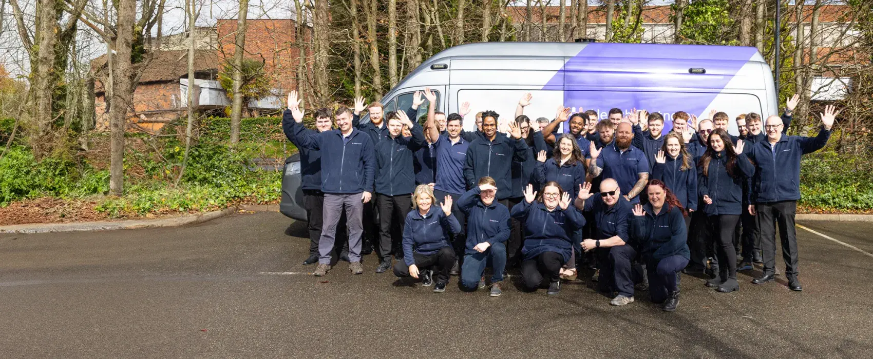 Employees in front of MMU van