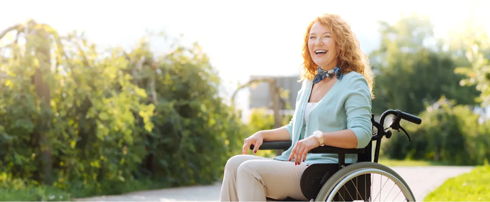 Woman smiling in a wheelchair