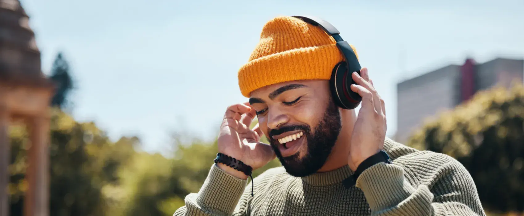 Man outdoors with headphones on
