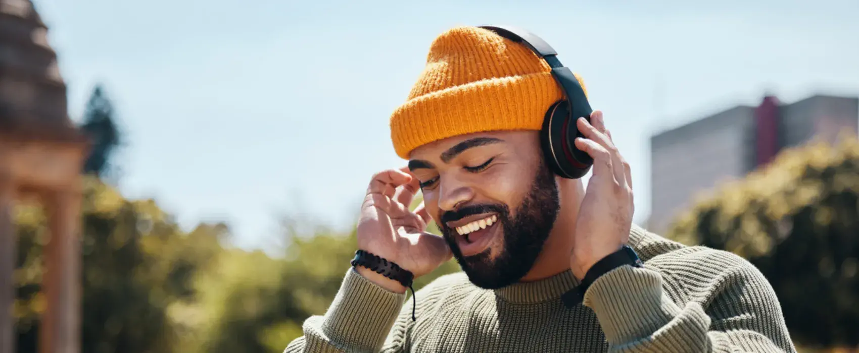 Man outdoors with headphones on