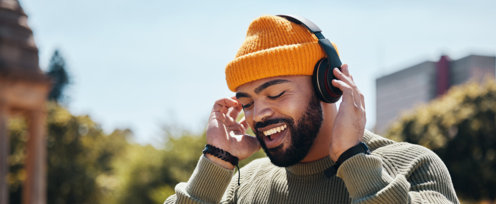Man outdoors with headphones on