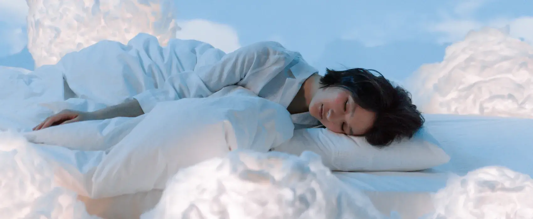 Woman sleeping on a cloud