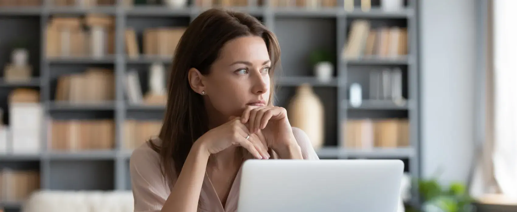 Woman sat at laptop