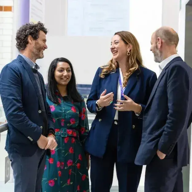 Group of employees chatting