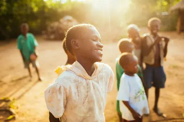 Children playing in sunlight